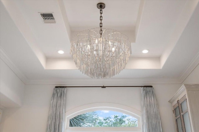 24729 Travis Lakeside Cv, Spicewood, TX 78669 - detailed view of a tray ceiling, recessed lighting, crown molding, and a chandelier