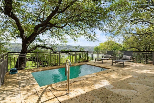 24729 Travis Lakeside Cv, Spicewood, TX 78669 - view of swimming pool featuring a patio area