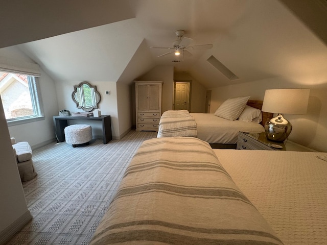 24729 Travis Lakeside Cv, Spicewood, TX 78669 - bedroom featuring vaulted ceiling, light carpet, and ceiling fan