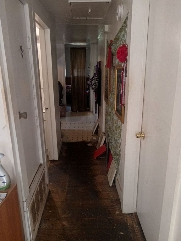 3208 E 16th St, Austin, TX 78721 - hallway featuring wood finished floors