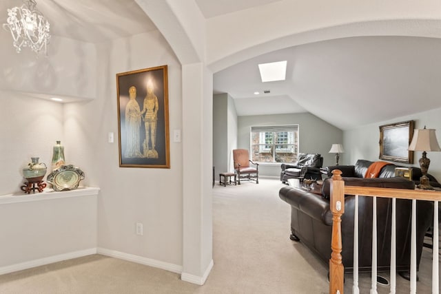 2907 Briona Wood Ln, Cedar Park, TX 78613 - living room with carpet, vaulted ceiling, a skylight, and arched walkways