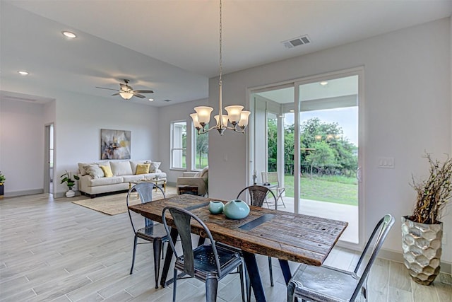 162 Puu Waa Waa Ln, Bastrop, TX 78602 - dining area featuring baseboards, light wood-type flooring, a chandelier, ceiling fan, and recessed lighting