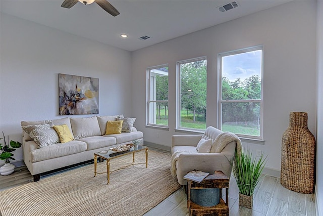 162 Puu Waa Waa Ln, Bastrop, TX 78602 - living area with light wood-type flooring, baseboards, ceiling fan, and recessed lighting