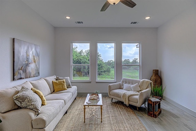 162 Puu Waa Waa Ln, Bastrop, TX 78602 - living room with light wood finished floors, recessed lighting, ceiling fan, and baseboards