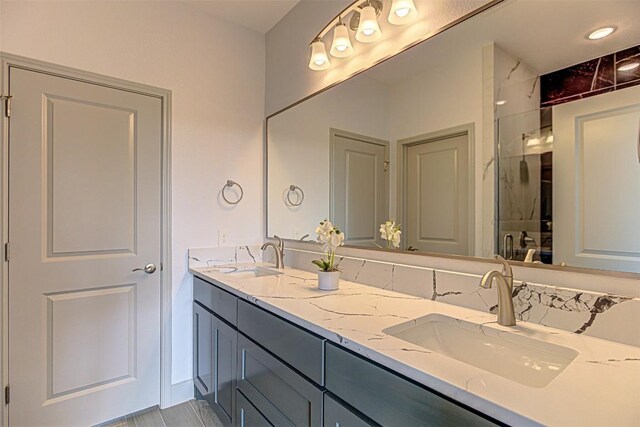 162 Puu Waa Waa Ln, Bastrop, TX 78602 - full bath with double vanity and an enclosed shower