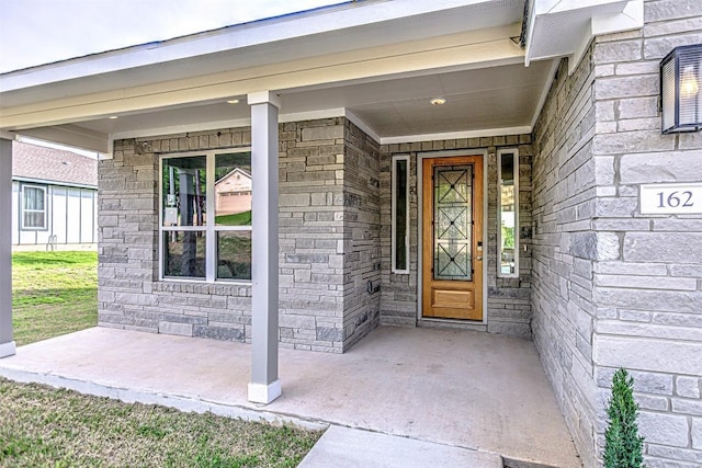 162 Puu Waa Waa Ln, Bastrop, TX 78602 - view of exterior entry with stone siding