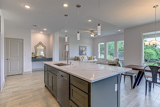 162 Puu Waa Waa Ln, Bastrop, TX 78602 - kitchen featuring a sink, stainless steel dishwasher, light wood-style floors, pendant lighting, and recessed lighting