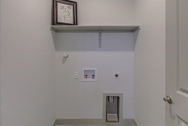 laundry area featuring hookup for a gas dryer, washer hookup, hookup for an electric dryer, and baseboards
