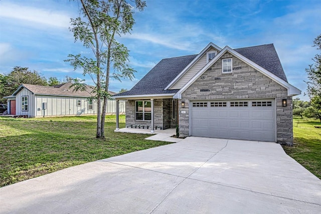 162 Puu Waa Waa Ln, Bastrop, TX 78602 - view of front of house with stone siding, driveway, a front yard, a garage, and a shingled roof