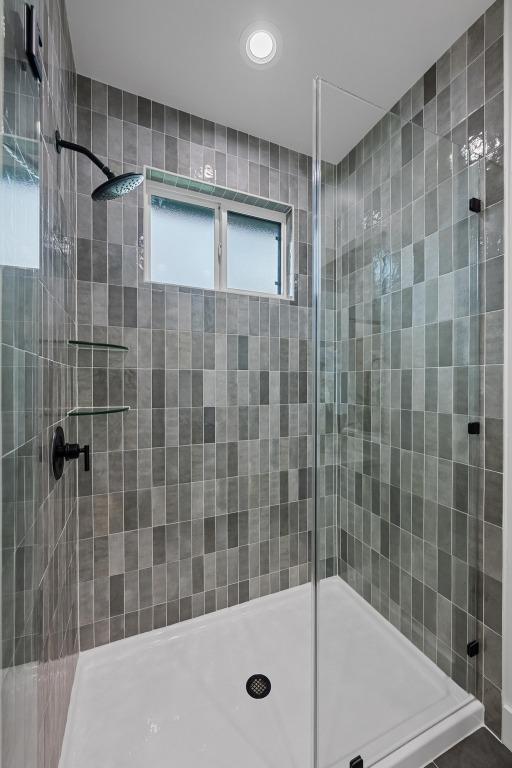 1906 Willow St Unit 2, Austin, TX 78702 - bathroom featuring a stall shower and recessed lighting