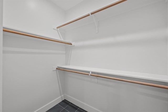 1906 Willow St Unit 2, Austin, TX 78702 - spacious closet featuring dark tile patterned flooring