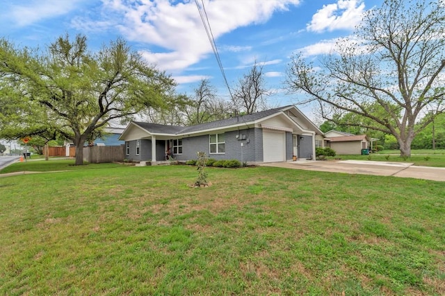 1701 Davis St, Taylor, TX 76574 - single story home featuring concrete driveway, an attached garage, and brick siding