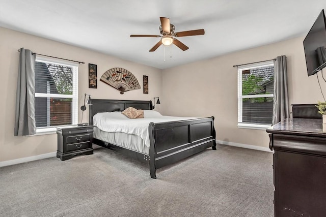 1701 Davis St, Taylor, TX 76574 - bedroom with multiple windows, carpet floors, and ceiling fan