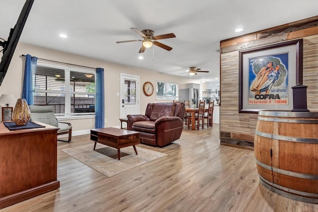 1701 Davis St, Taylor, TX 76574 - living room featuring a ceiling fan, light wood-type flooring, recessed lighting, and baseboards