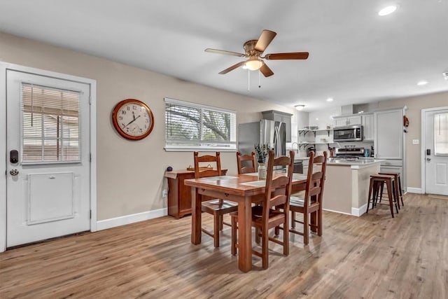 1701 Davis St, Taylor, TX 76574 - dining area with ceiling fan, light wood-style flooring, baseboards, and recessed lighting