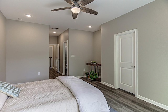 153 E Keanahalululu Ln, Bastrop, TX 78602 - bedroom featuring wood finished floors, baseboards, recessed lighting, and ceiling fan