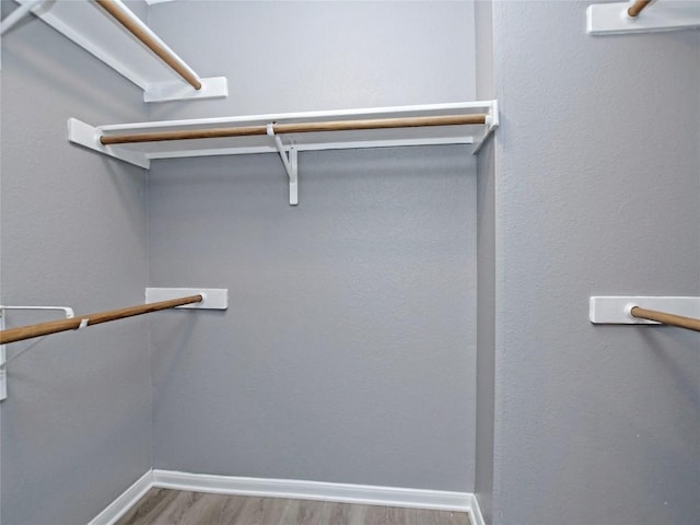 118 Dogwood Dr, Georgetown, TX 78626 - spacious closet featuring wood finished floors