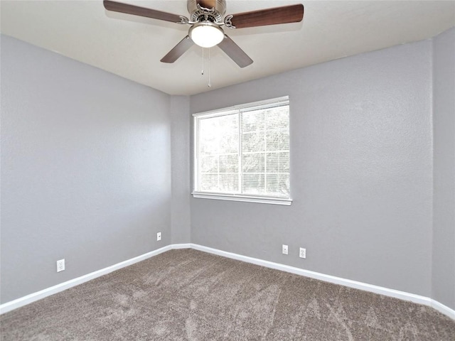 118 Dogwood Dr, Georgetown, TX 78626 - spare room featuring carpet flooring, a ceiling fan, and baseboards