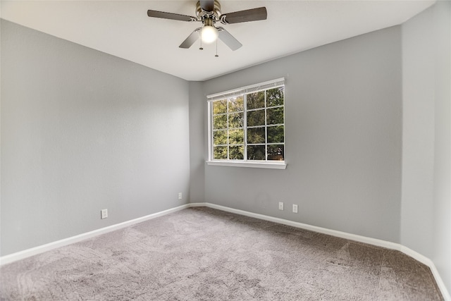 118 Dogwood Dr, Georgetown, TX 78626 - carpeted empty room featuring baseboards and a ceiling fan
