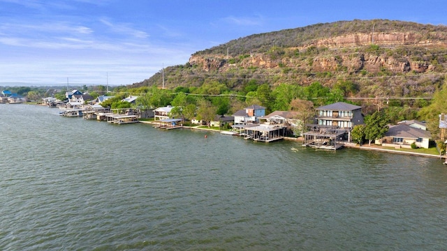 932 Scenic Loop, Kingsland, TX 78639 - water view with a boat dock and mountains