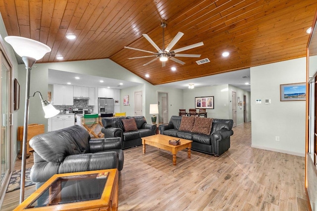932 Scenic Loop, Kingsland, TX 78639 - living room with light wood-type flooring, vaulted ceiling, wood ceiling, ceiling fan, and recessed lighting