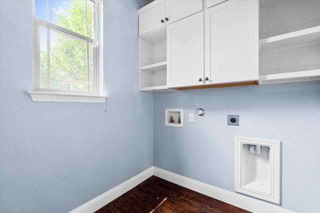 100 Matthews, Kyle, TX 78640 - laundry area featuring baseboards, hookup for an electric dryer, cabinet space, washer hookup, and dark wood finished floors