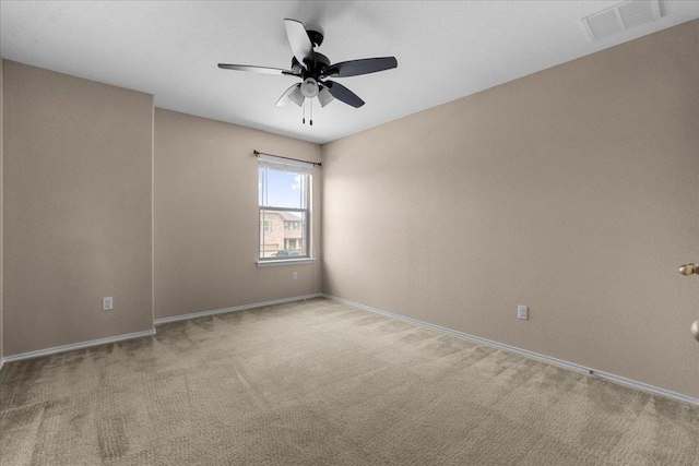 100 Matthews, Kyle, TX 78640 - carpeted empty room with a ceiling fan and baseboards