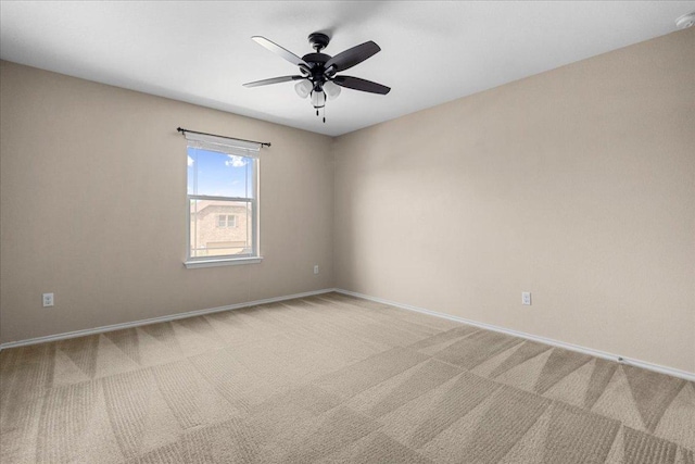 100 Matthews, Kyle, TX 78640 - empty room with light carpet, baseboards, ceiling fan, and a smoke detector