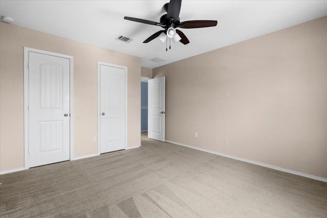100 Matthews, Kyle, TX 78640 - unfurnished bedroom featuring carpet floors, baseboards, and ceiling fan