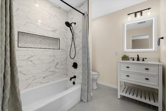 100 Matthews, Kyle, TX 78640 - bathroom with shower / tub combo, toilet, vanity, baseboards, and tile patterned floors