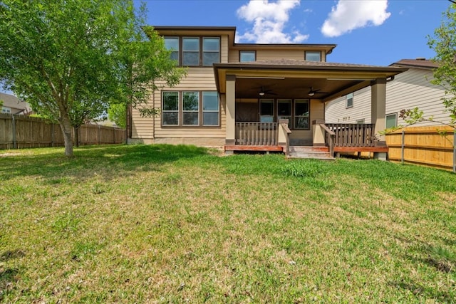 100 Matthews, Kyle, TX 78640 - back of house with a ceiling fan and a deck