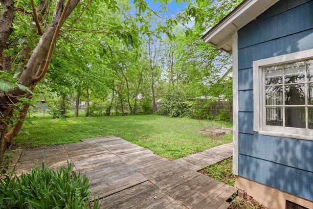 7202 Marcell St, Austin, TX 78752 - fenced backyard with a deck