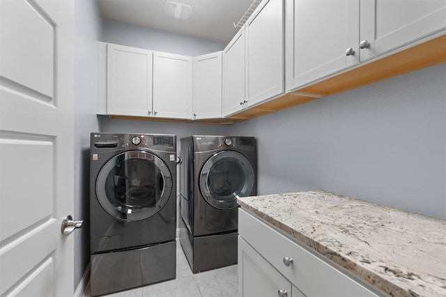 2015 Colina Cv, Cedar Park, TX 78613 - laundry room featuring cabinet space and washing machine and clothes dryer