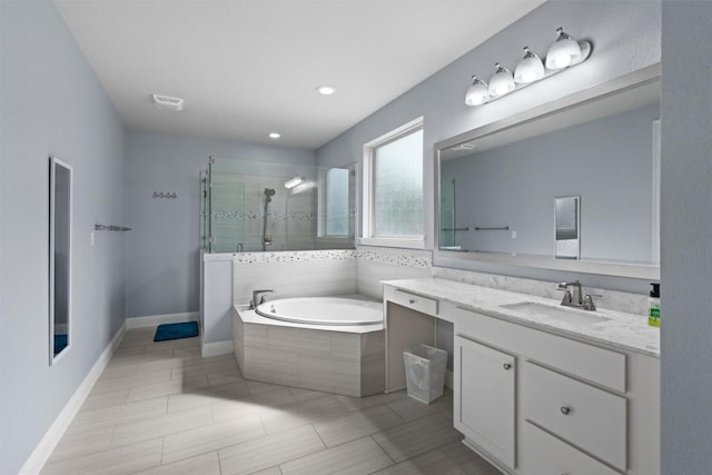 2015 Colina Cv, Cedar Park, TX 78613 - full bath with vanity, tiled shower, a garden tub, and recessed lighting