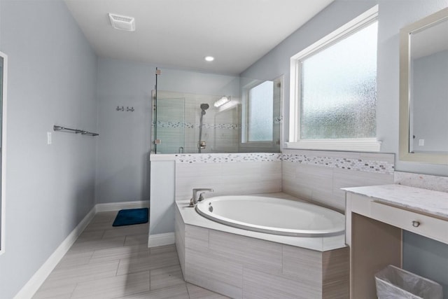 2015 Colina Cv, Cedar Park, TX 78613 - full bath with a bath, tiled shower, vanity, tile patterned flooring, and recessed lighting