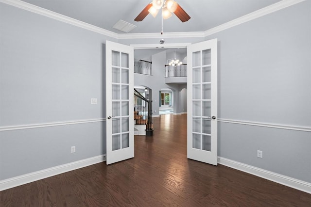 2015 Colina Cv, Cedar Park, TX 78613 - empty room with french doors, wood finished floors, arched walkways, a ceiling fan, and crown molding