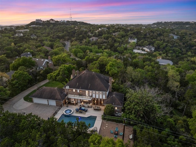 6605 Canon Wren Dr, Austin, TX 78746 - aerial view at dusk of view of pool