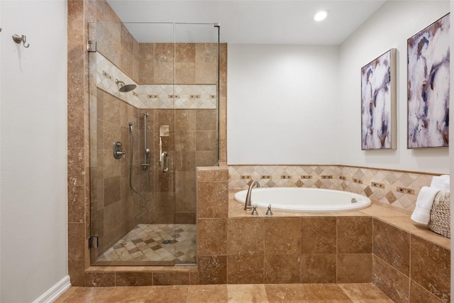 6605 Canon Wren Dr, Austin, TX 78746 - bathroom with a garden tub, a shower stall, and recessed lighting