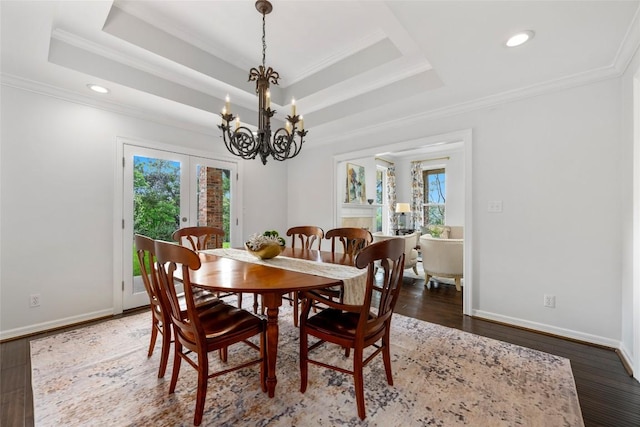 6605 Canon Wren Dr, Austin, TX 78746 - dining room featuring healthy amount of natural light, a chandelier, ornamental molding, dark wood-type flooring, and recessed lighting