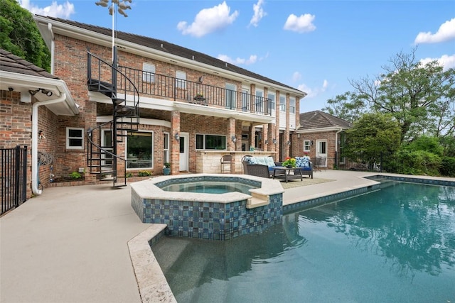 6605 Canon Wren Dr, Austin, TX 78746 - view of swimming pool featuring a patio area, a pool with connected hot tub, an outdoor living space, and stairway