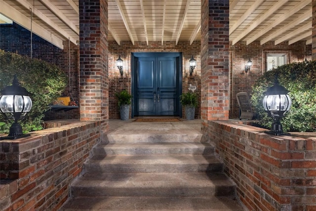6605 Canon Wren Dr, Austin, TX 78746 - entrance to property with brick siding and a porch