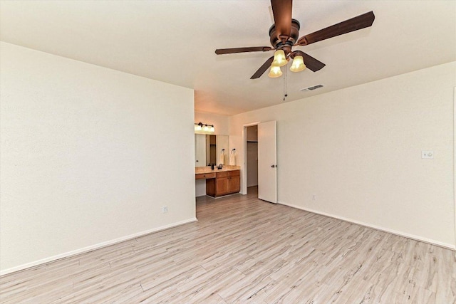 5003 Wing Rd, Austin, TX 78749 - spare room with light wood-style flooring, baseboards, and a ceiling fan