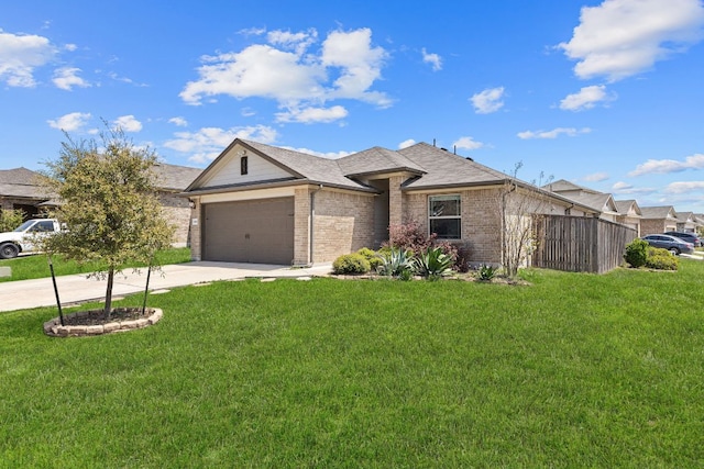 13801 Rosebud Isle Dr, Manor, TX 78653 - view of front facade featuring brick siding, concrete driveway, an attached garage, and a shingled roof