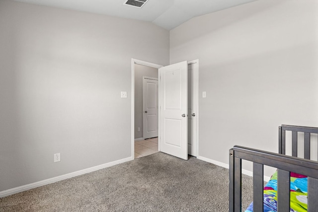 13801 Rosebud Isle Dr, Manor, TX 78653 - carpeted bedroom with vaulted ceiling and baseboards