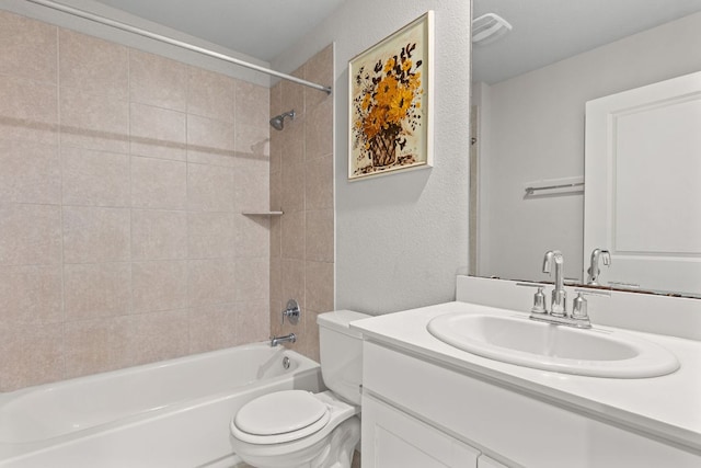 13801 Rosebud Isle Dr, Manor, TX 78653 - full bathroom featuring toilet, vanity, shower / tub combination, and a textured wall