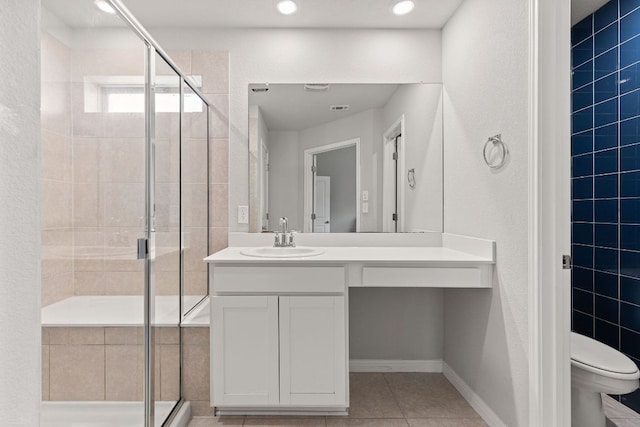 13801 Rosebud Isle Dr, Manor, TX 78653 - bathroom featuring a stall shower, vanity, toilet, and recessed lighting