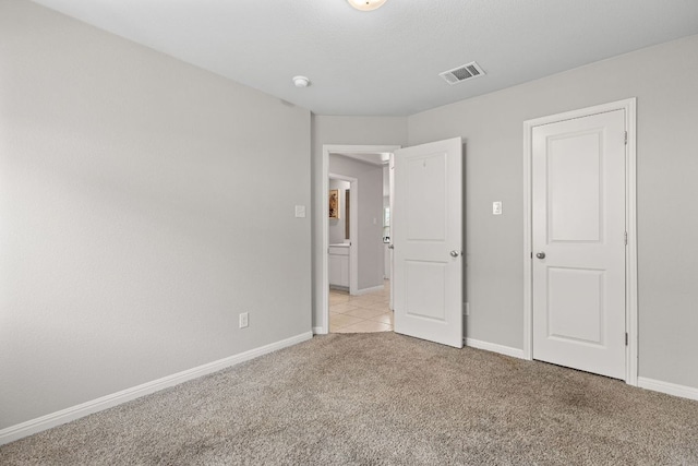 13801 Rosebud Isle Dr, Manor, TX 78653 - unfurnished bedroom featuring light carpet and baseboards