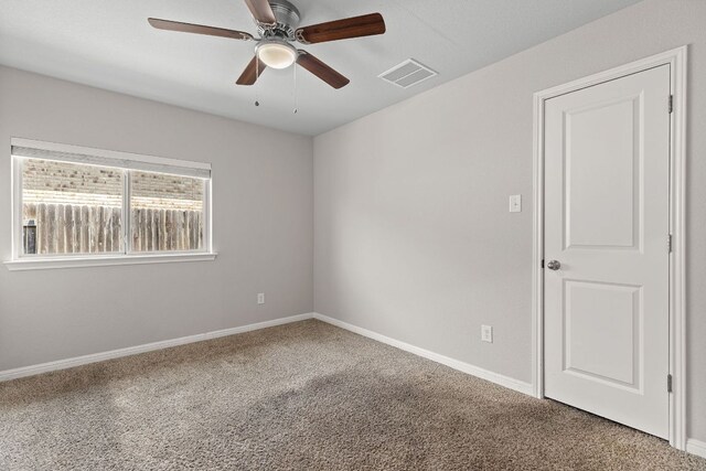 13801 Rosebud Isle Dr, Manor, TX 78653 - empty room featuring carpet, ceiling fan, and baseboards