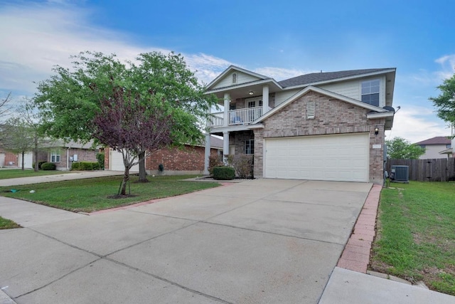 13605 Lyndon B Johnson St, Manor, TX 78653 - view of front of home with cooling unit, driveway, a garage, and stone siding