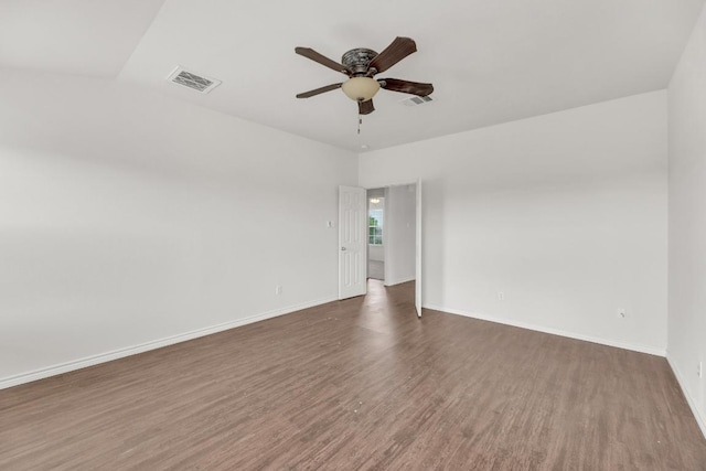 13605 Lyndon B Johnson St, Manor, TX 78653 - empty room featuring wood finished floors, a ceiling fan, and baseboards
